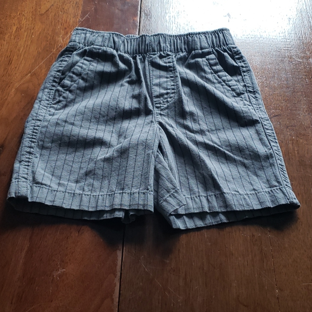 Grey shorts with black strip